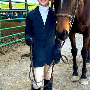 Grand Prix Dark blue girls size Large show coat. Light weight and stretchy.
